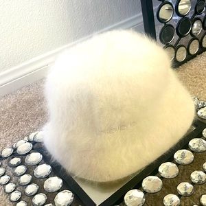 Bebe soft white furry bucket styled hat.